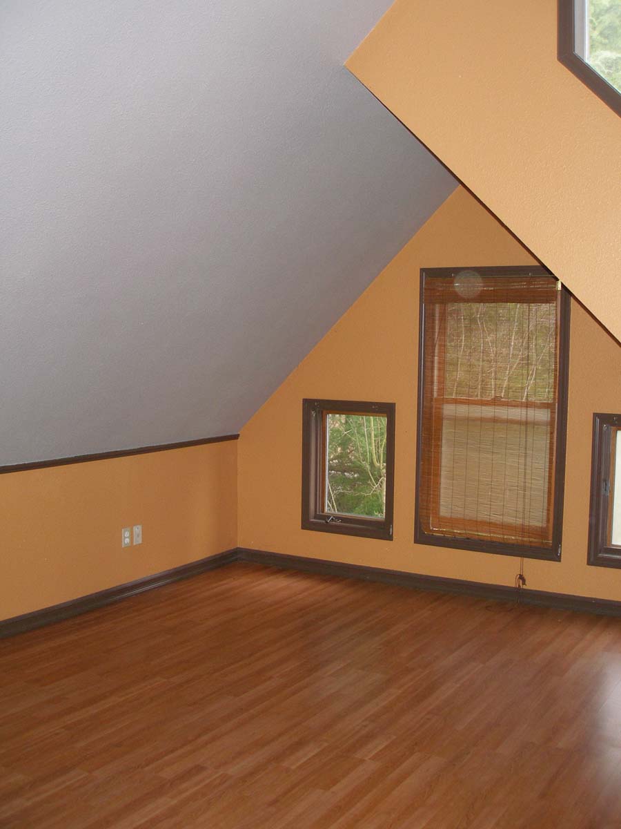 before version of interior painting of upstairs bonus room with wood floors in Salem Keizer Oregon