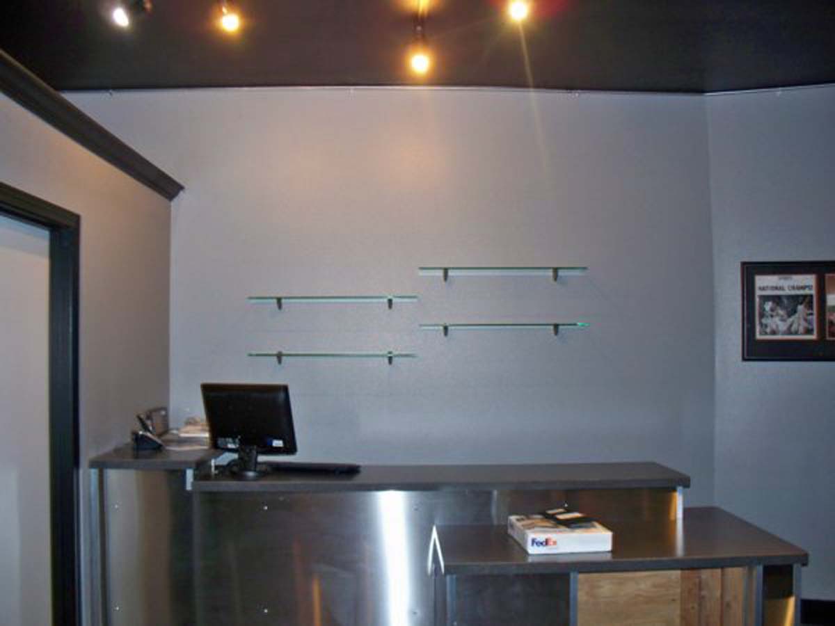 commercial interior painting with glass shelves and crown in Salem Keizer Oregon