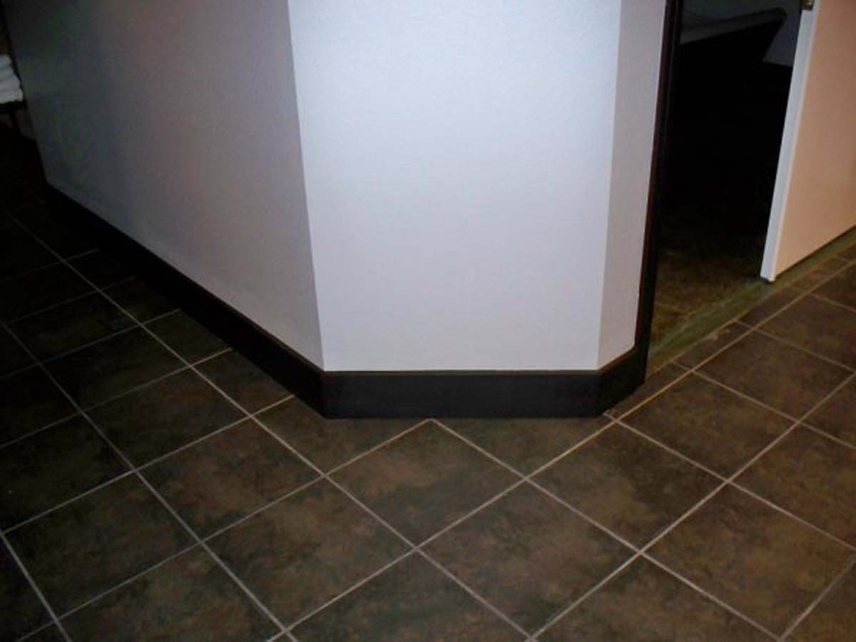 commercial interior painting with baseboard and tile in Salem Keizer Oregon